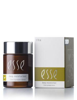 A 1.7 fl. oz. jar of Esse Deep Moisturiser is positioned beside its packaging box. The jar features a brown color with a black lid and white text, while the predominantly white box has a green section, displaying the same product name and branding.